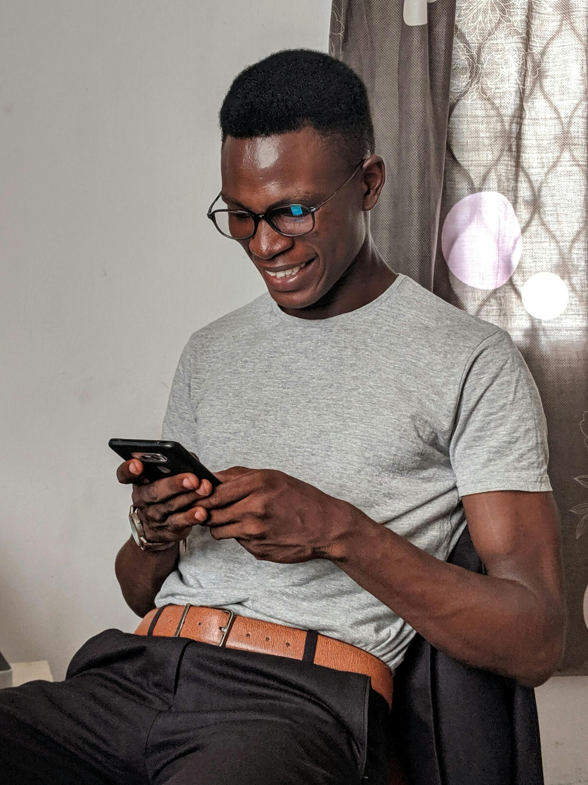 Happy young person with Phone